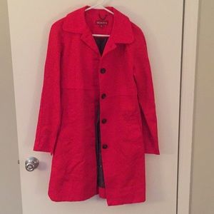 Bright red trench coat